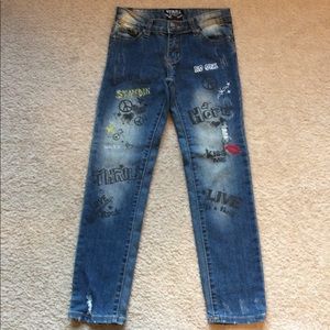 Girls Thrill distressed jeans.